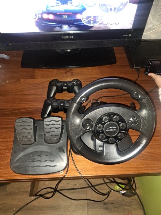 Vînd volan cu pedale si doua manete