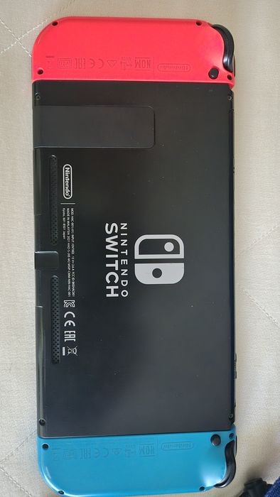 Consolă Nintendo Switch 1  Neon Blue/Red + Husă de protecție Mario - Stare Foarte Bună