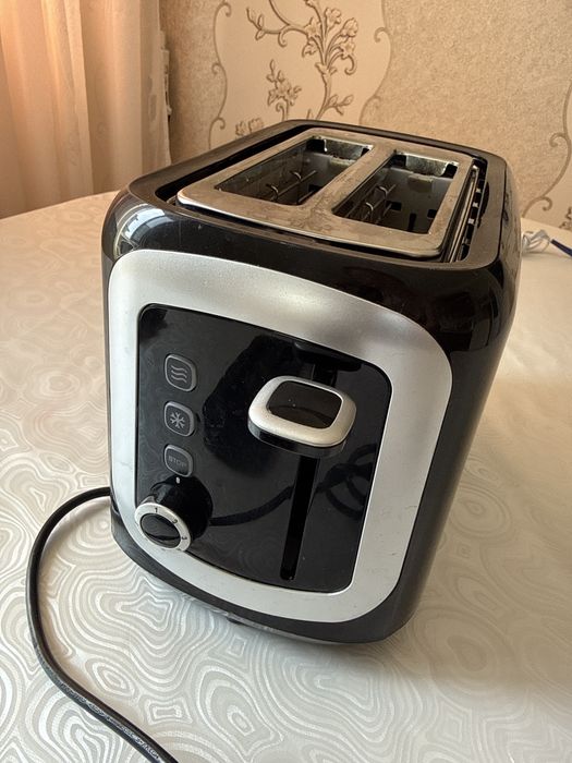 Продам тостер Electrolux