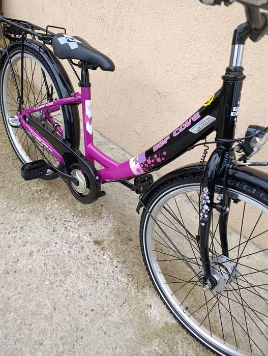 Vând bicicletă copii cu roți pe 24.