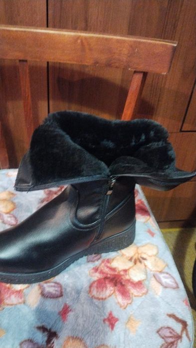 Женские сапоги..