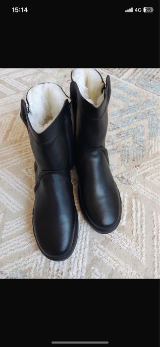 Продам новые зимние сапоги