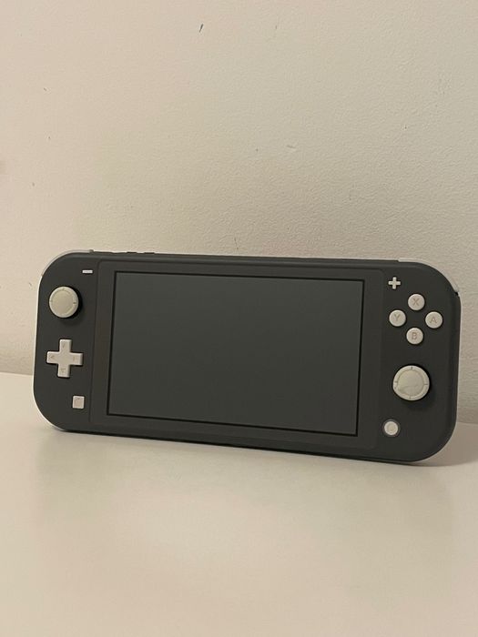 Nintendo Switch Lite, Gri, Incarcator si Joc Inclus