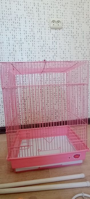 Клетка для попугая розовой цвет
