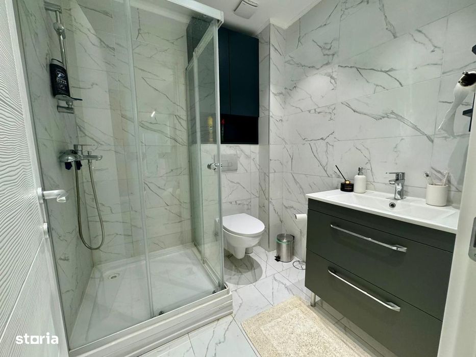 COSMOPOLIS - Apartament cu 3 camere si gradina, mobilat si utilat.