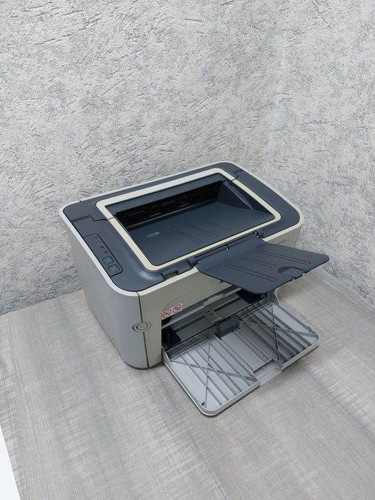 HP LaserJet P1505
принтер