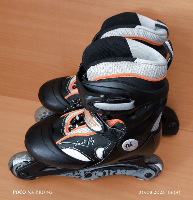 Роликовые коньки