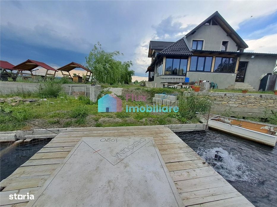 Casa cu teren si doua pastravarii in Fantana Mare