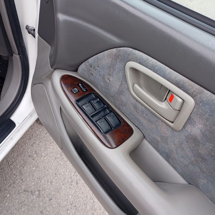 Тайота камрй грация