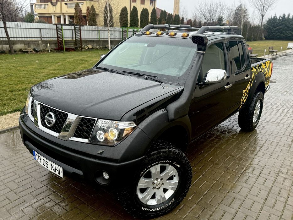 Nissan Navara D40/2008/piele/trapa