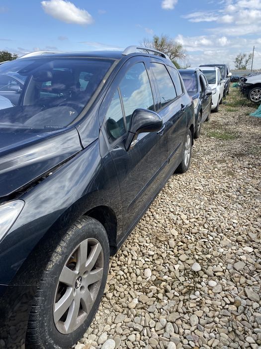 Ușă stânga față Peugeot 308 2012