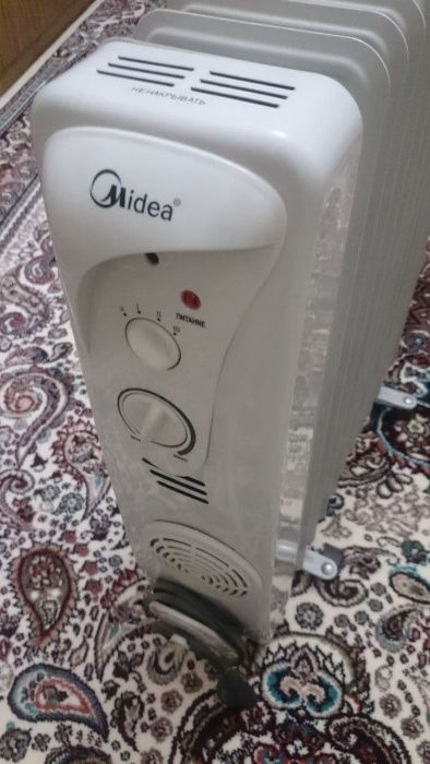 Обогреватель масляный Midea