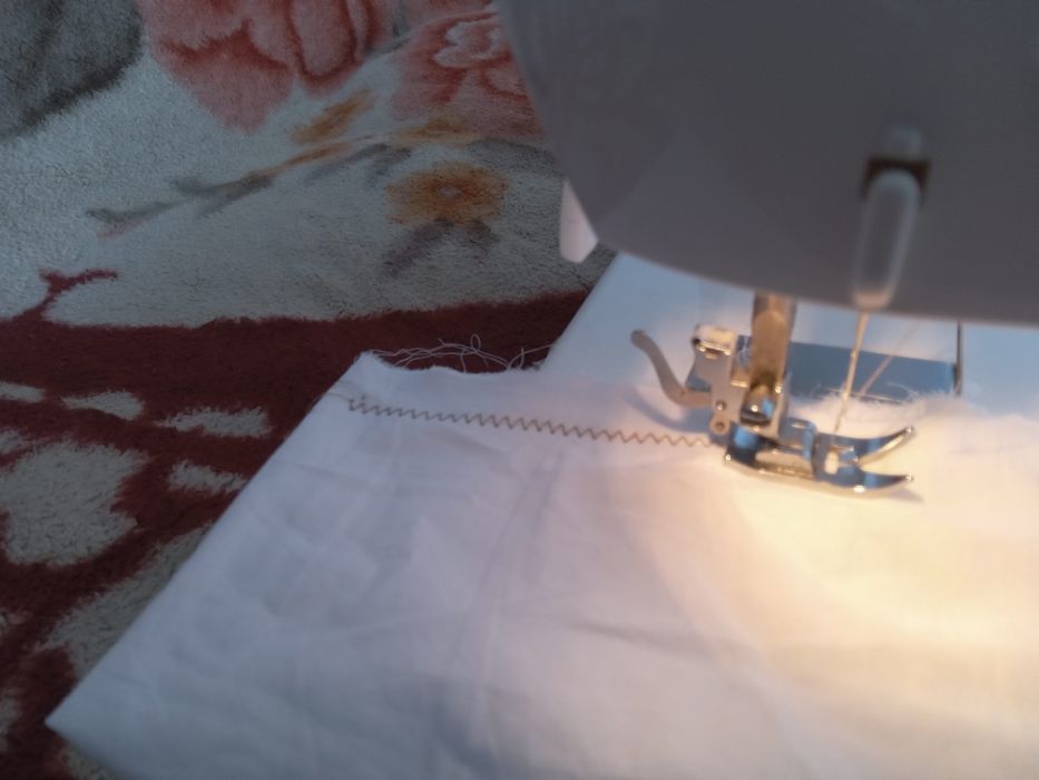 Masina de cusut Singer