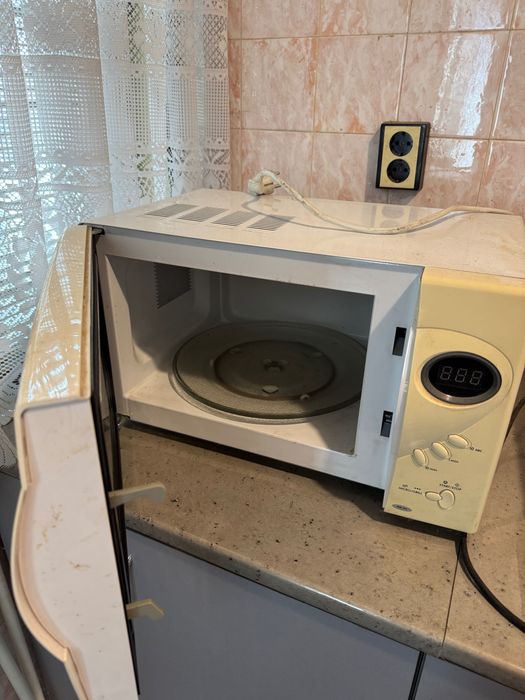 Микровълнова печка Delonghi