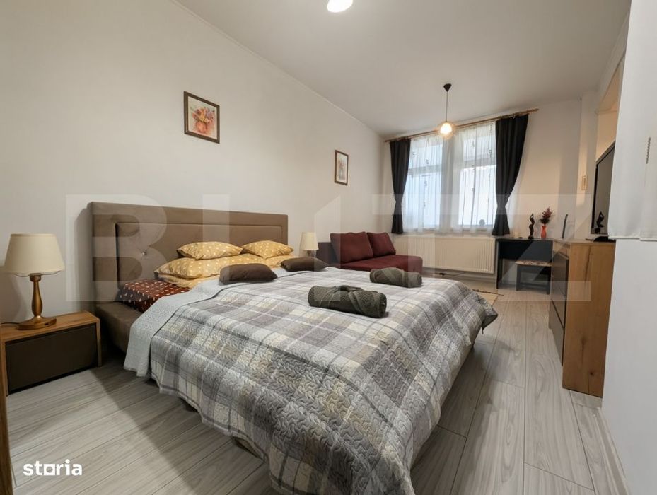 Apartament ultracentral, cu o camera si curte comuna