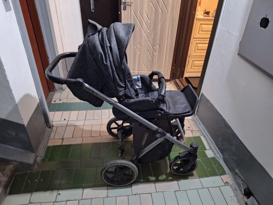 Детская передвижная коляска