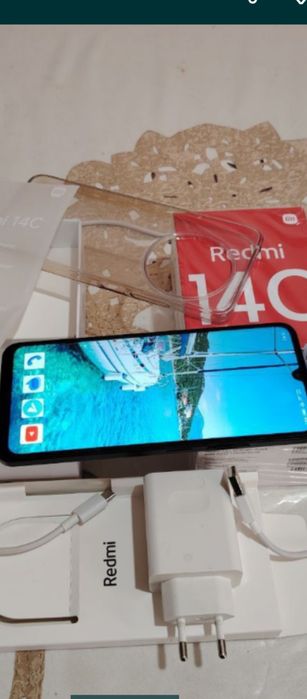 Янги холатда Редми 14С