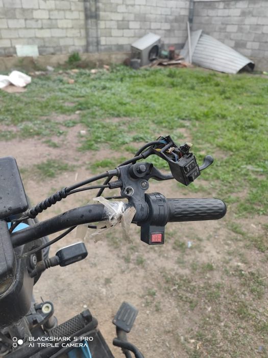 Трицикл скутер а