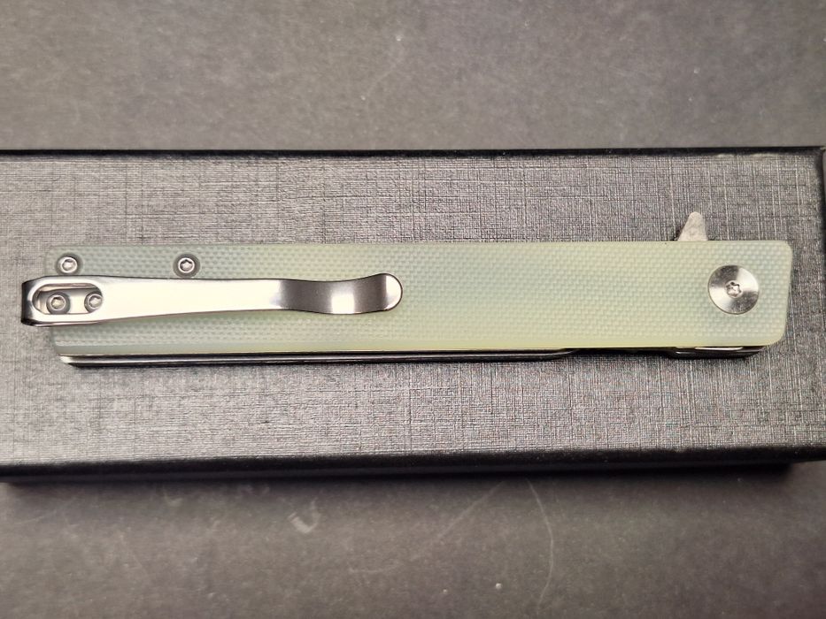 Сгъваем нож-стомана D2-дръжка G10