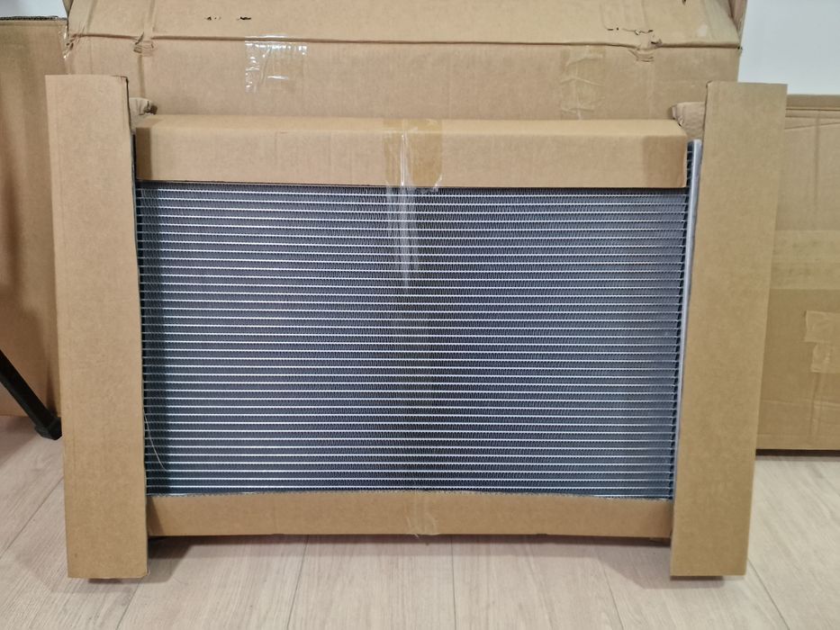 Радиатор охл./конд. Geely Emgrand