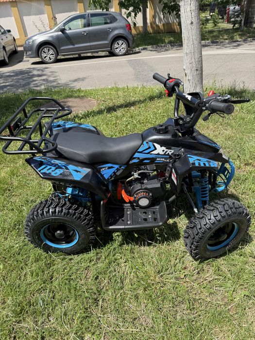 ATV Copii XTR 49cc 4CP – Pornire Electrică  Buton și Telecomandă | Alarmă | 2 Tobe Sport | Roți 6”