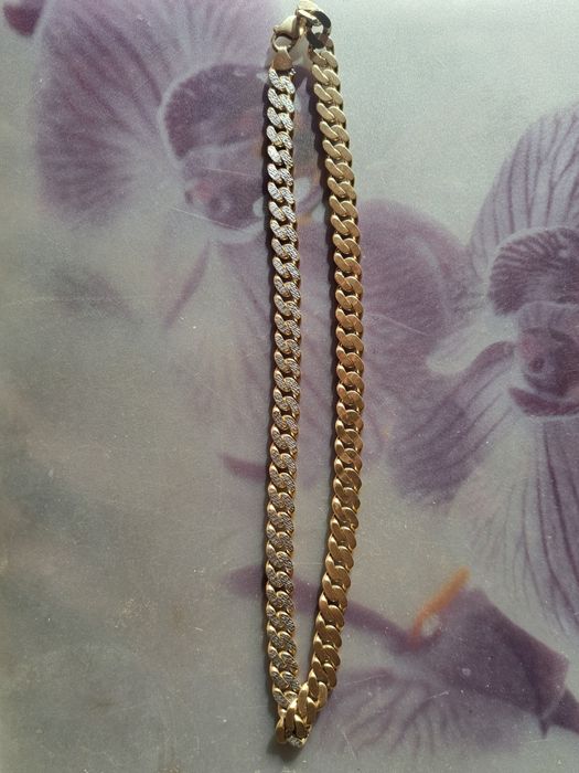 Златен синджир-ланец 14карата,дължина 58см.ширина 10мм.двулицев-49гр.