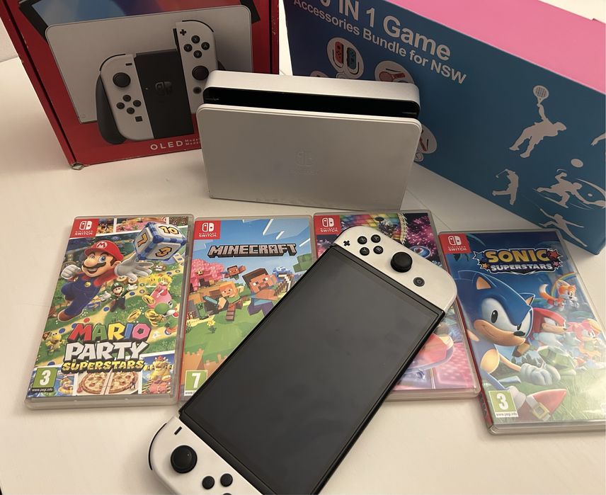 Nintendo Switch OLED + 4 jocuri + accesorii | aproape nou