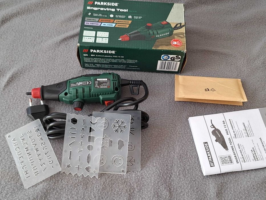 Aparat de gravură Parkside (model PGG 15 G6), destinată gravării pe diverse materiale precum metal, piatră, ceramică, plastic, sticlă și lemn
