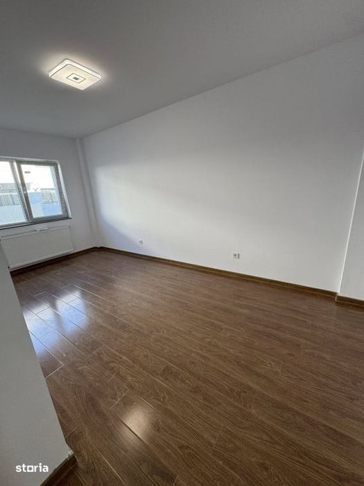 Apartament de Vanzare I SU 55mp I Balcon I Garaj - Terra