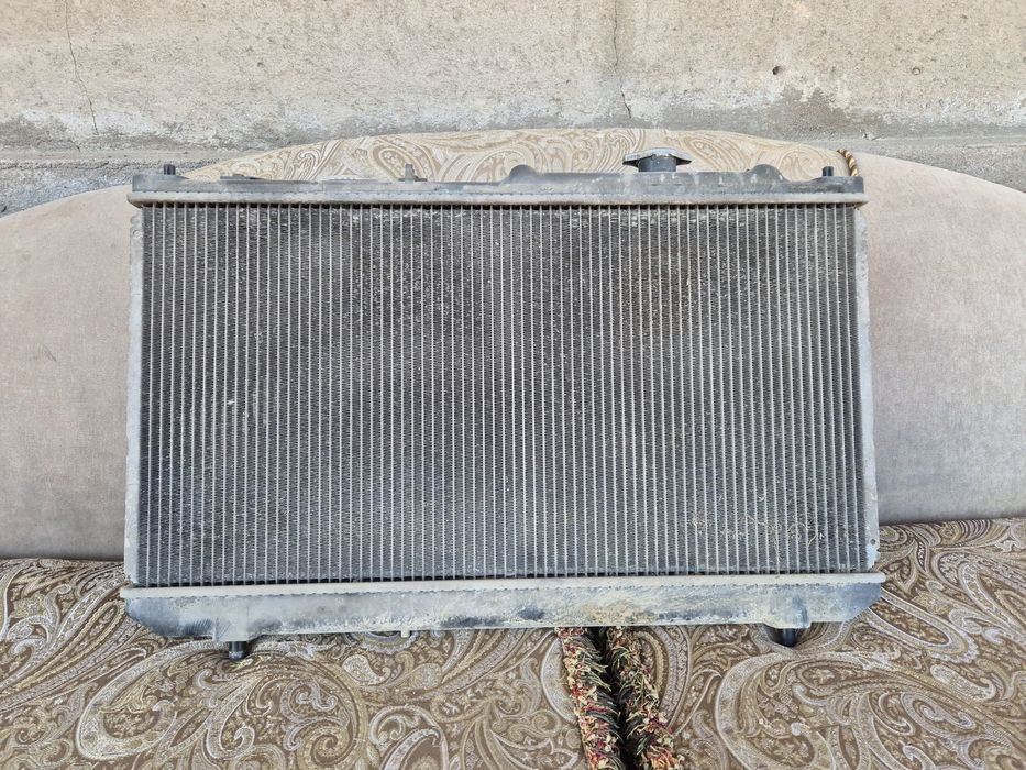 Радиатор на мазда премаси