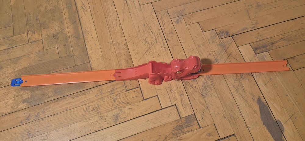 Lansator Hot Wheels DINO – Lansare prin Coadă (Gravitational)