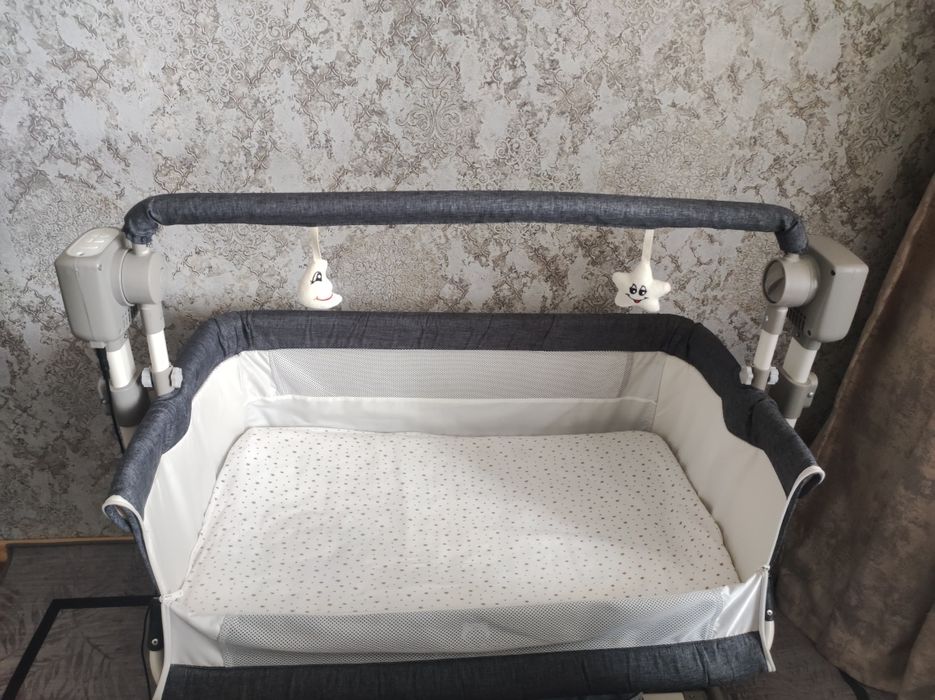 Кроватка с автоукачеванием