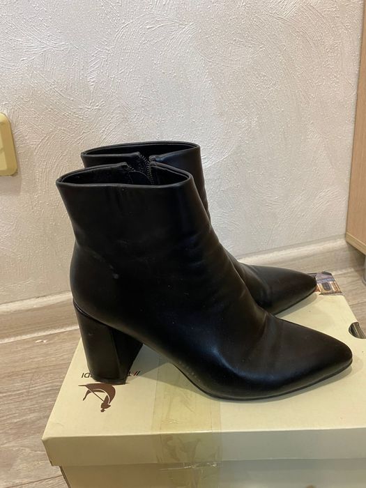 Продам новые сапоги