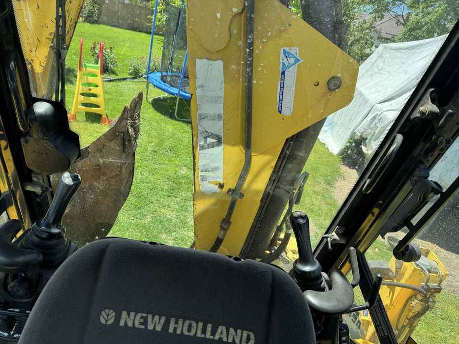 Buldoexcavator New Holland LB110