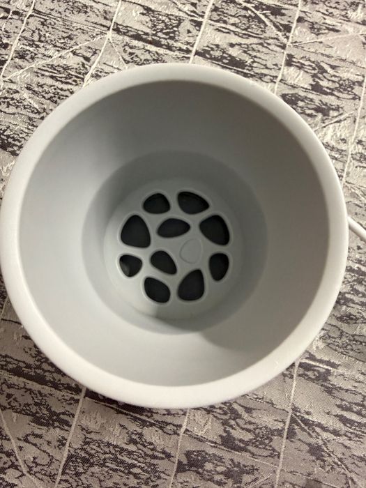 Уред за затопляне на шишета