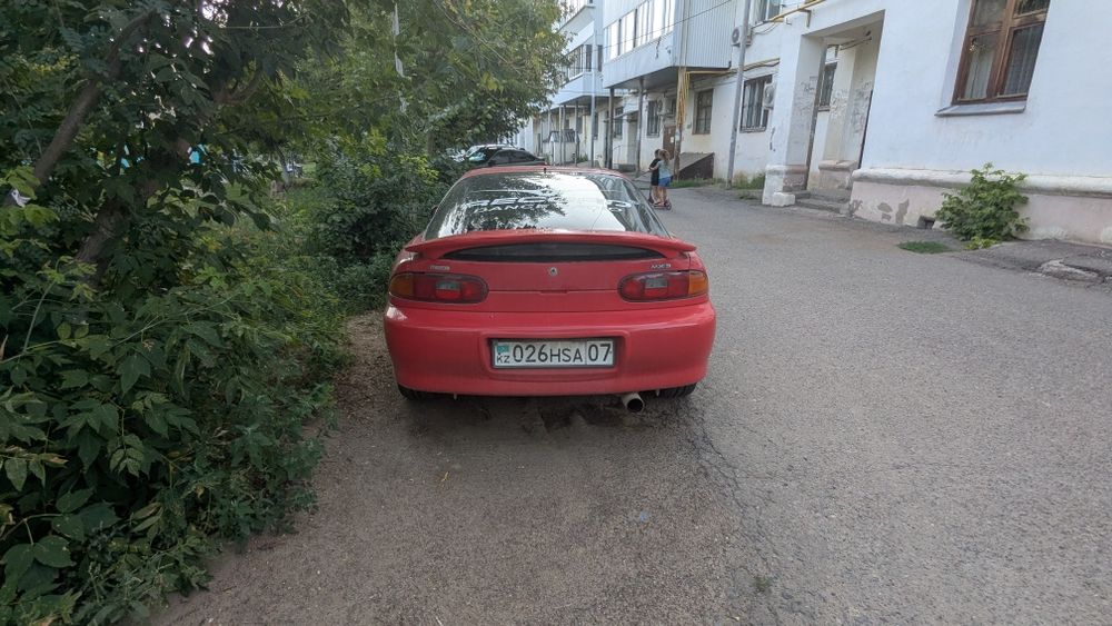 Машина (автомобиль) Mazda MX3 1992