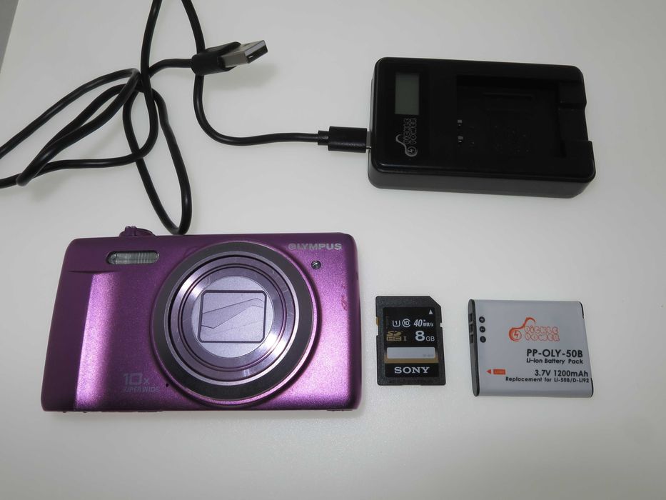 Olympus D750 16MP розов фотоапарат цифрова камера, работи перфектно