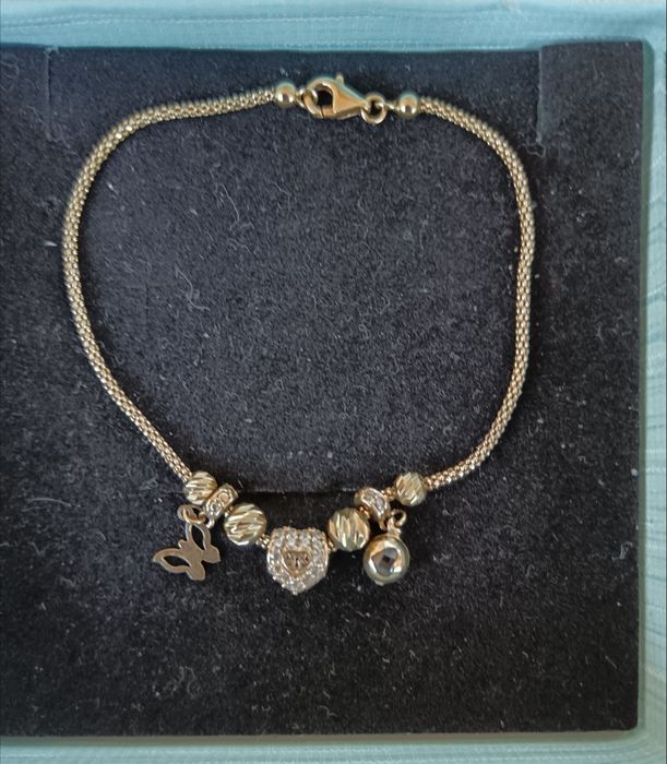 Продавам златна гривна пандора 14карата