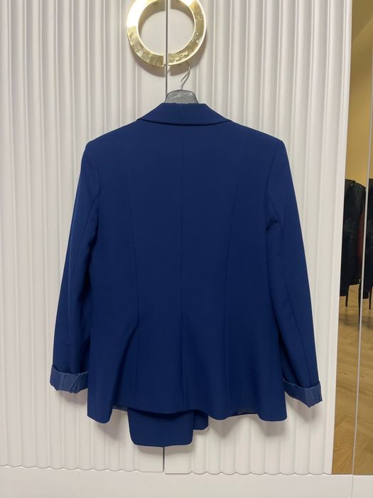 Продам костюм с брюками