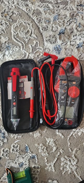 Продам мультиметр клещ и ручку тестер за 8000 тг.