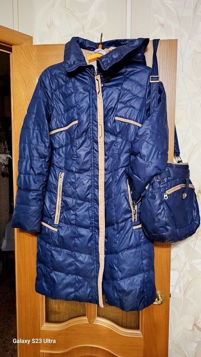 Продам пуховик в комплекте идет сумка