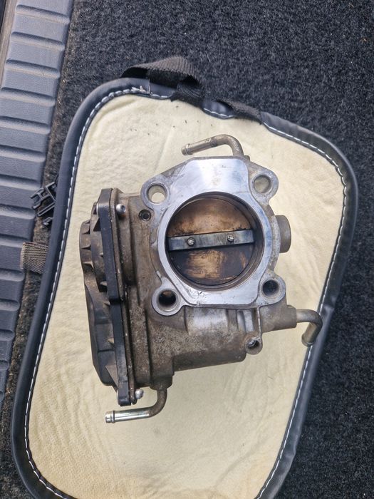 Дросильная заслонка