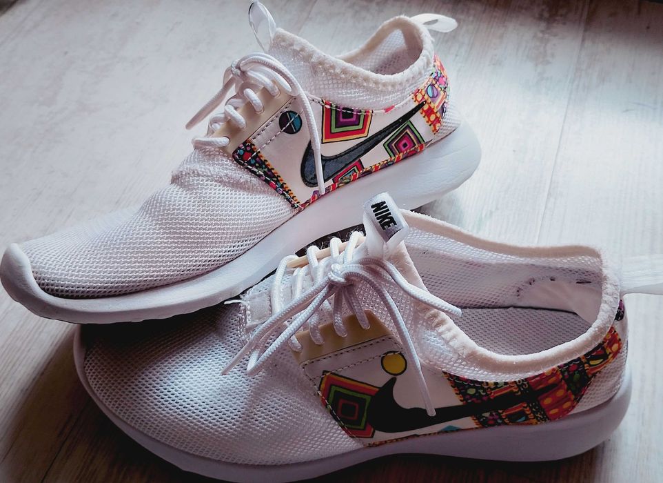 Маратононки Nike Juvenate Rare Merlin Print