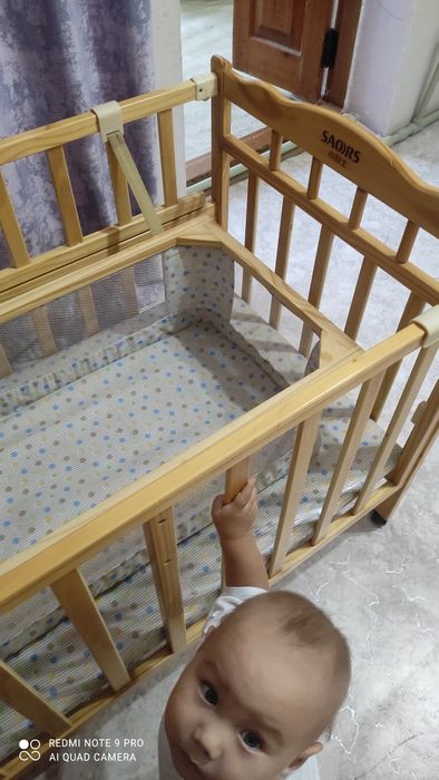 Детская кроватка с люлькой