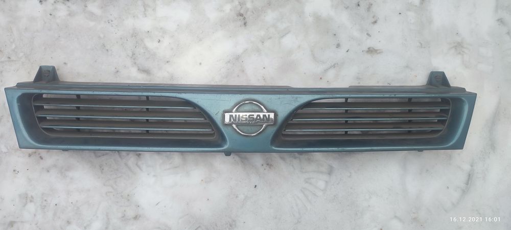 Ниссан сани решетка радиатора