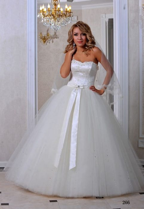 Платья свадебные новые