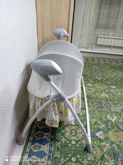 Продаю детские автоматически качели