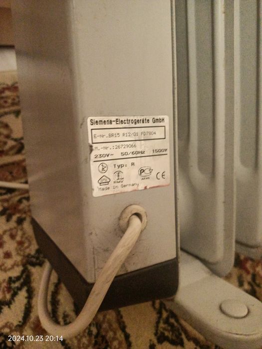 Масляный обогреватель