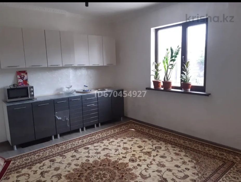 Дом в центре Мерке .