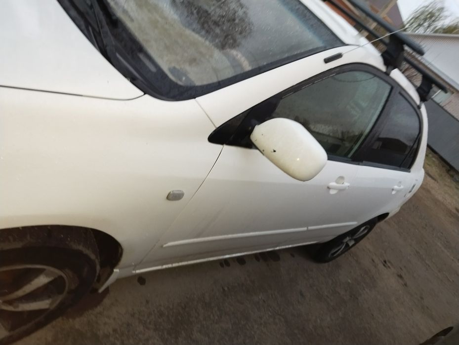 Тойота каролла 2006